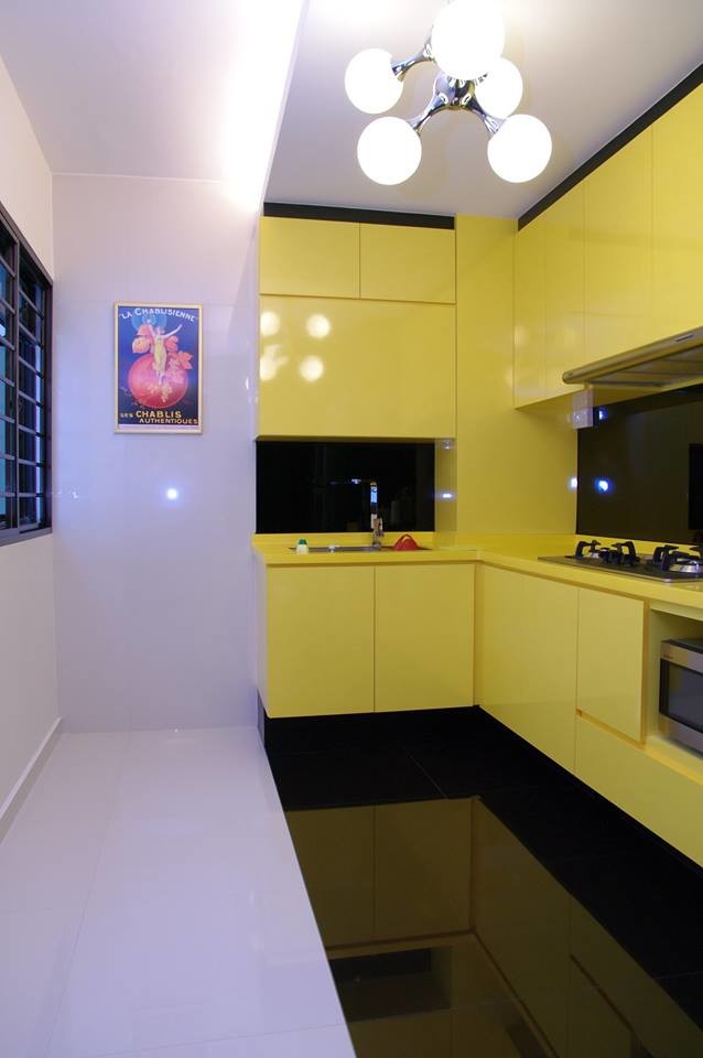 Photo of a modern l-shaped separate kitchen in Singapore with a drop-in sink, marble floors and no island.