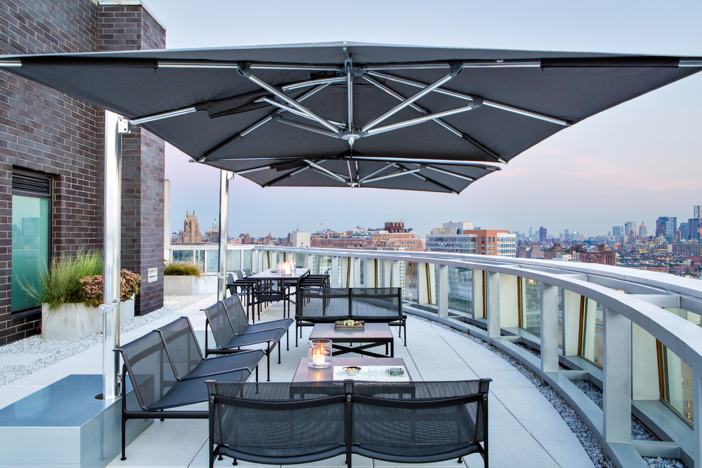 Photo of a contemporary rooftop and rooftop deck in New York with no cover.