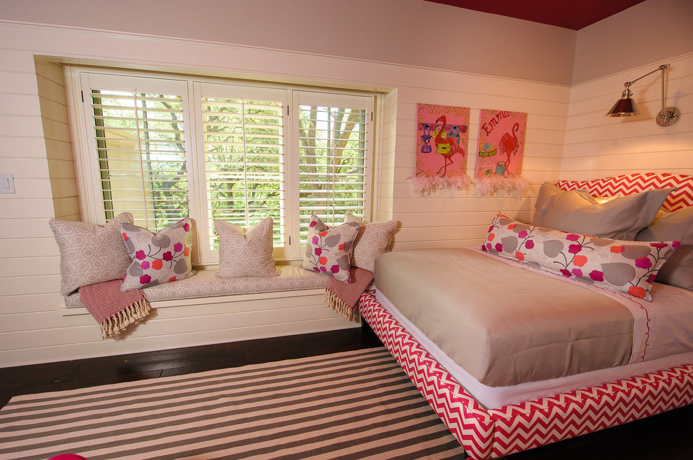 Inspiration for a large contemporary kids' room for girls in Austin with beige walls and medium hardwood floors.