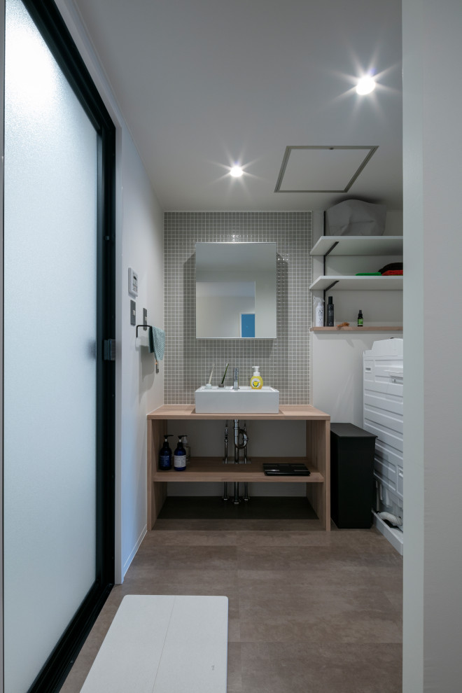 他の地域にあるおしゃれなトイレ・洗面所の写真