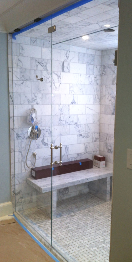 Large traditional master bathroom in Raleigh with an alcove shower, gray tile, stone slab and blue walls.