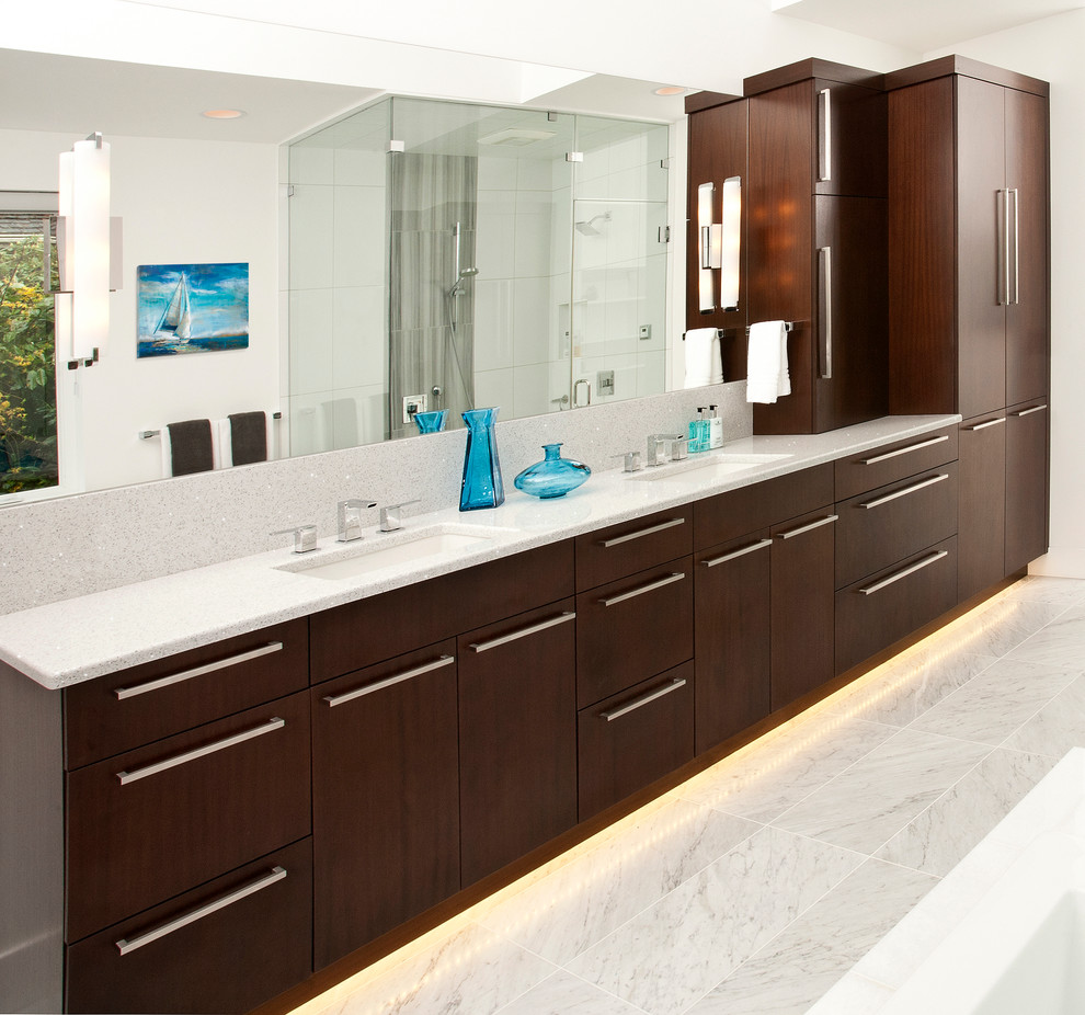 Example of a large trendy master white tile marble floor bathroom design in Seattle with an undermount sink, flat-panel cabinets, dark wood cabinets, marble countertops and white walls