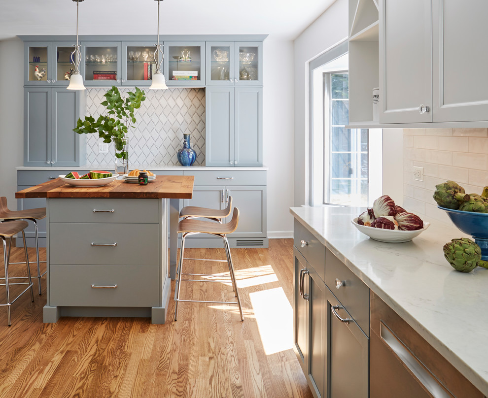 Inspiration for a transitional kitchen remodel in Chicago with an island