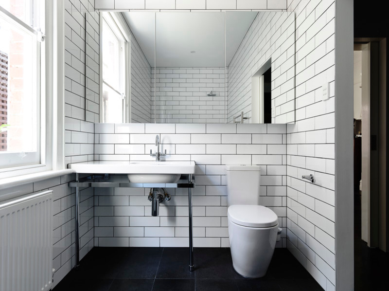 Inspiration for a contemporary bathroom in Melbourne with a pedestal sink, a one-piece toilet, white tile, ceramic tile and white walls.
