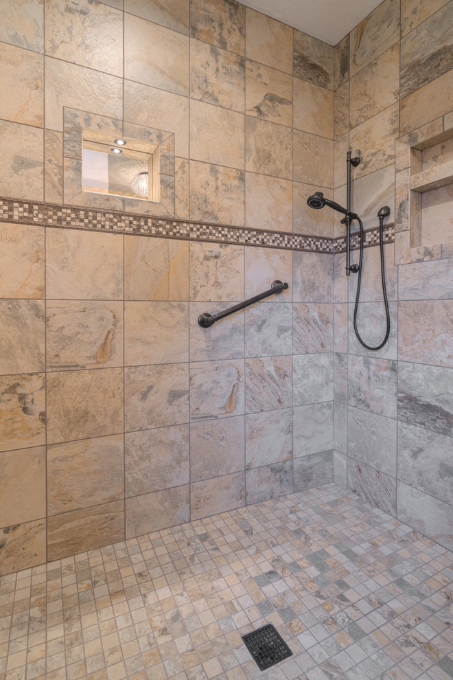 Mid-sized transitional master multicolored tile ceramic tile home design photo with raised-panel cabinets, beige cabinets, a two-piece toilet, beige walls, an undermount sink and quartz countertops