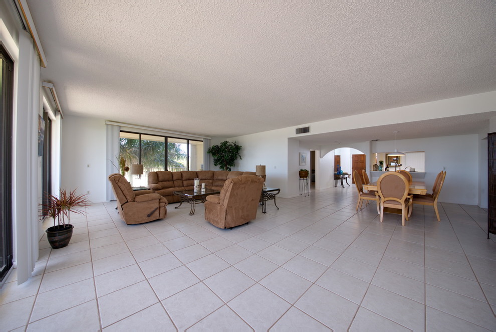 Living room - coastal living room idea in Orlando
