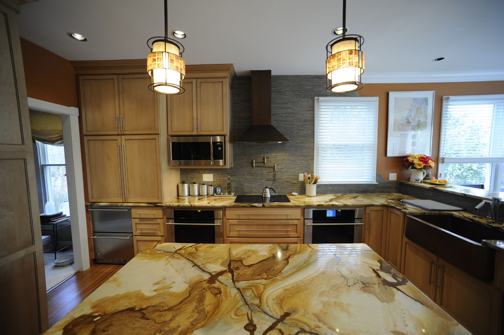 Mid-sized transitional u-shaped light wood floor eat-in kitchen photo in Baltimore with a farmhouse sink, beaded inset cabinets, light wood cabinets, onyx countertops, stainless steel appliances and an island