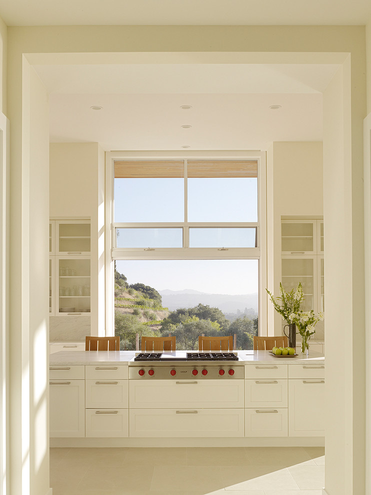 Design ideas for a transitional separate kitchen in San Francisco with shaker cabinets, white cabinets, white splashback and with island.