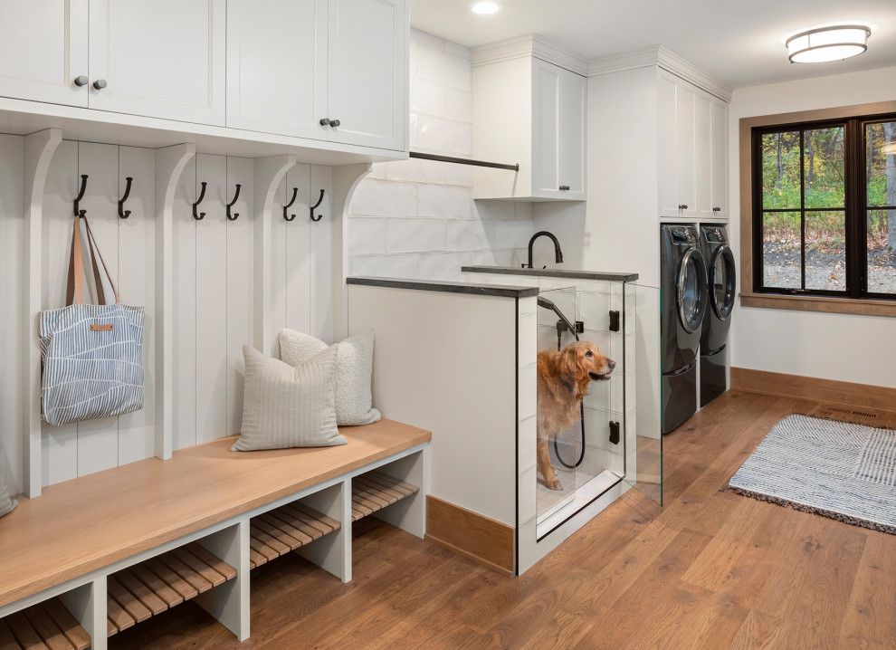 Example of a beach style laundry room design in Minneapolis