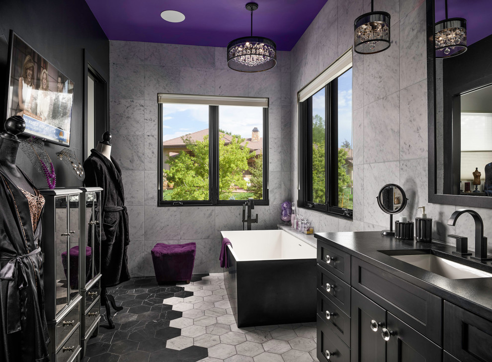 Inspiration for a contemporary bathroom in Denver with shaker cabinets, black cabinets, a freestanding tub, white tile, black walls, an undermount sink, multi-coloured floor, black benchtops and a built-in vanity.