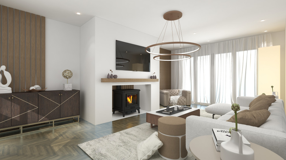 Immagine di un piccolo soggiorno moderno chiuso con pareti bianche, pavimento in legno massello medio, stufa a legna, TV a parete e pannellatura