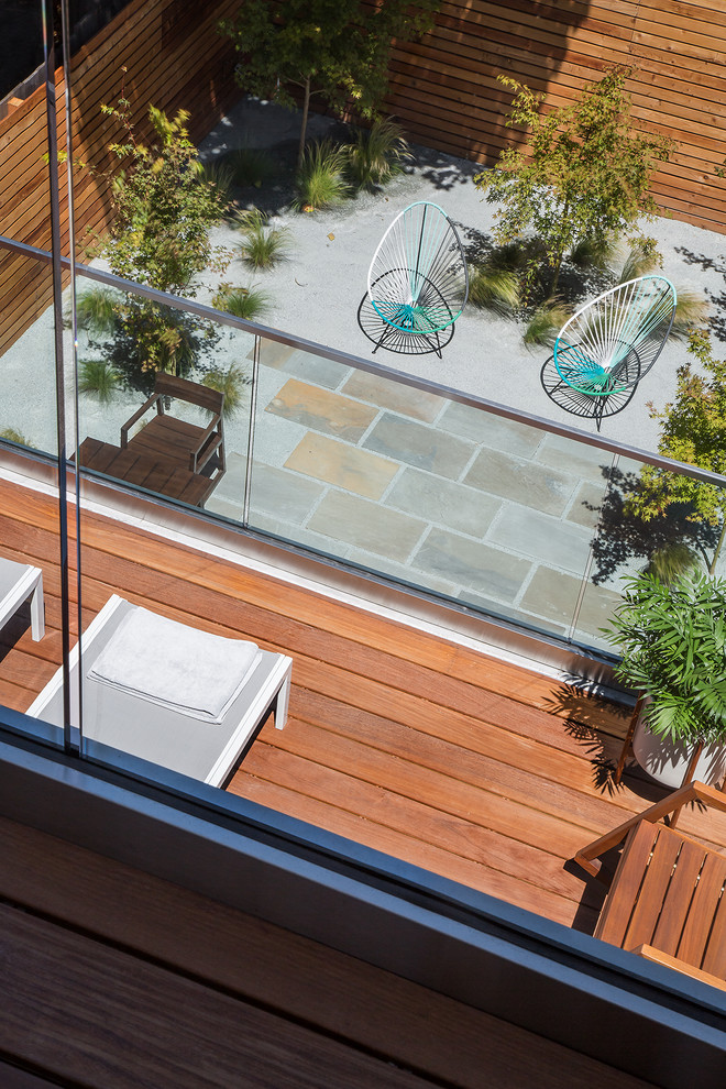 Photo of a mid-sized contemporary backyard deck in San Francisco with no cover.