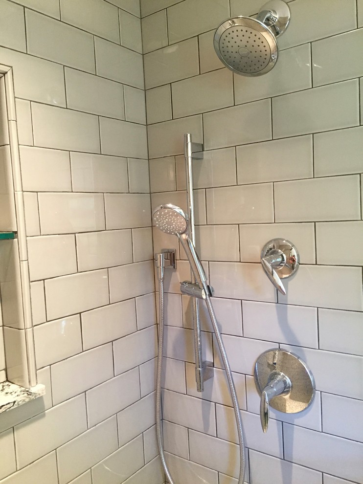 Home design - small transitional master gray tile and porcelain tile porcelain tile home design idea in DC Metro with shaker cabinets, white cabinets, a two-piece toilet, green walls, an undermount sink and quartz countertops