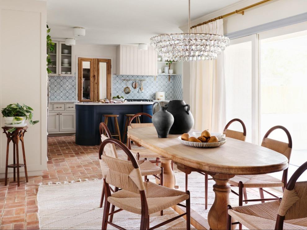 Transitional kitchen photo in Austin with marble countertops, green backsplash, marble backsplash and white countertops