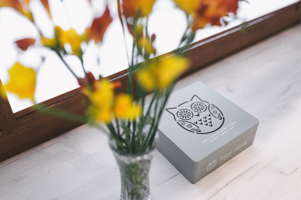 Example of a bedroom and small minimalist girl light wood floor home design design with multicolored walls