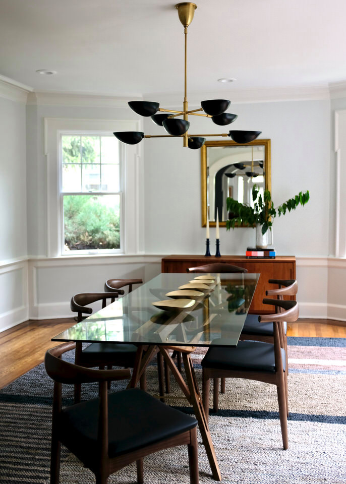 Inspiration for a large midcentury separate dining room in New York with grey walls and medium hardwood floors.