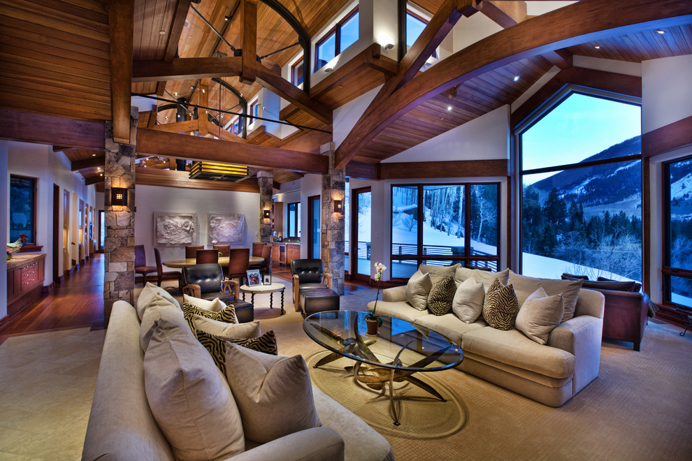This is an example of a large eclectic open concept living room in Denver.