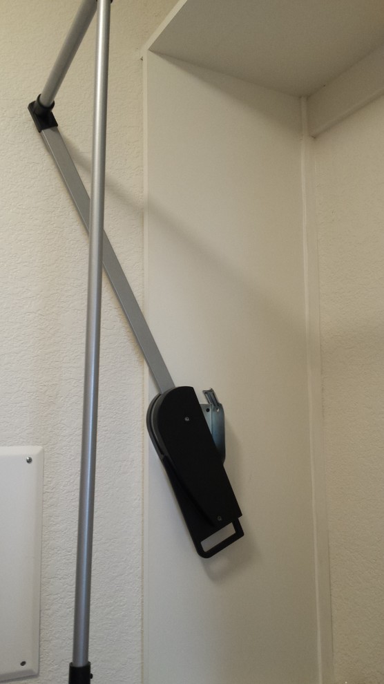 Pull down closet rods in laundry room and master closet.