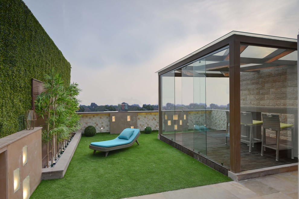 Photo of a mid-sized contemporary rooftop and rooftop deck in Delhi.