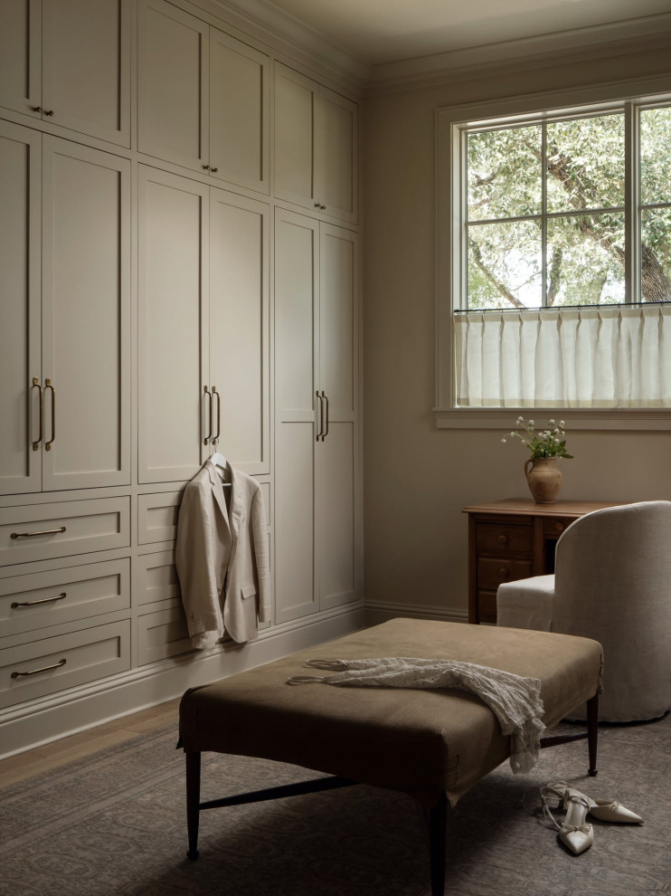 Walk-in closet - transitional women's medium tone wood floor and brown floor walk-in closet idea in Austin with shaker cabinets and beige cabinets