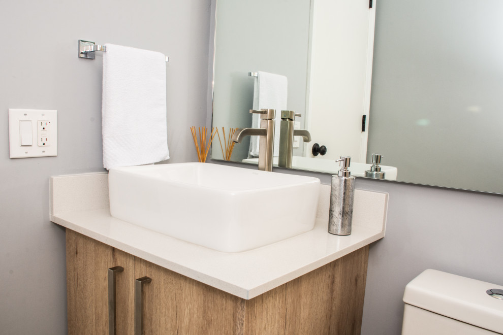 Example of a small transitional home design design in Miami