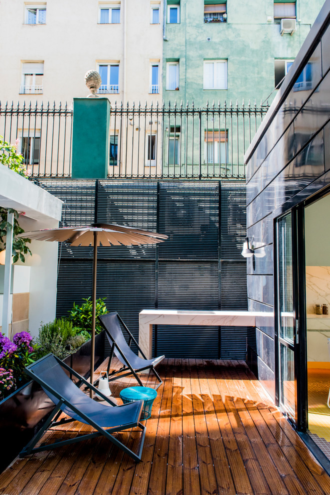 Foto de jardín escandinavo de tamaño medio con entablado