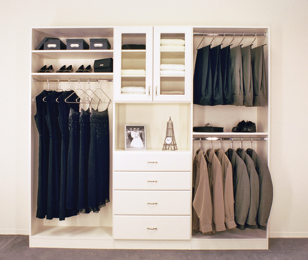 Photo of a mid-sized transitional gender-neutral walk-in wardrobe in Phoenix with glass-front cabinets, carpet, grey floor and white cabinets.