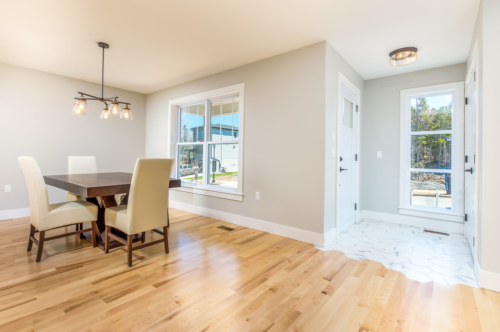 Mid-sized transitional ceramic tile and white floor single front door photo with a white front door