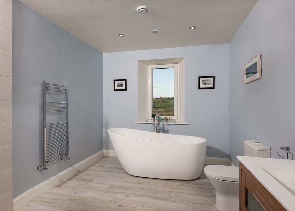 Inspiration for a contemporary bathroom in Cork with a freestanding tub.