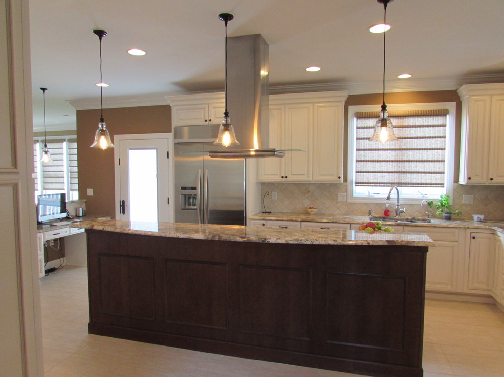 Large transitional l-shaped ceramic tile eat-in kitchen photo in DC Metro with an undermount sink, raised-panel cabinets, white cabinets, granite countertops, beige backsplash, ceramic backsplash, stainless steel appliances and an island