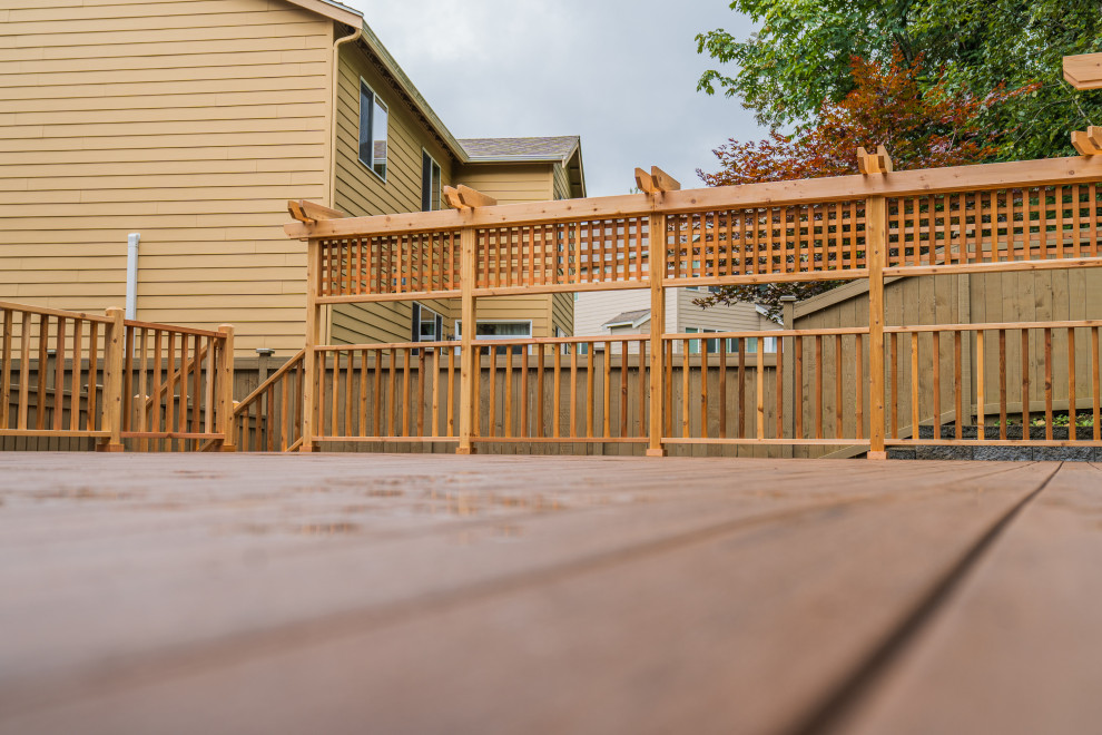 Inspiration for a mid-sized backyard deck remodel in Seattle