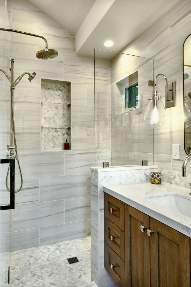 Photo of a mid-sized contemporary master bathroom in San Francisco with shaker cabinets, distressed cabinets, an alcove shower, a two-piece toilet, white tile, porcelain tile, white walls, light hardwood floors, an undermount sink, engineered quartz benchtops, blue floor, a hinged shower door, white benchtops, a double vanity, a floating vanity and vaulted.