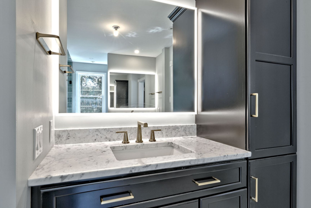 Inspiration for a large traditional ensuite bathroom in Philadelphia with flat-panel cabinets, black cabinets, an alcove shower, grey walls, mosaic tile flooring, a submerged sink, engineered stone worktops, white floors, grey worktops, a single sink and a built in vanity unit.