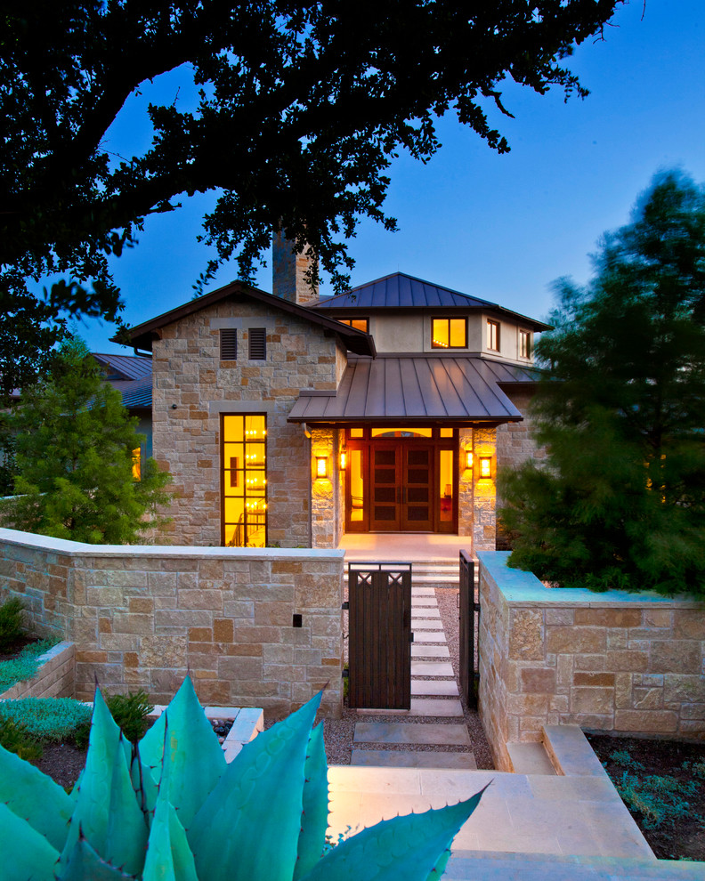 Traditional entryway in Austin with a double front door.
