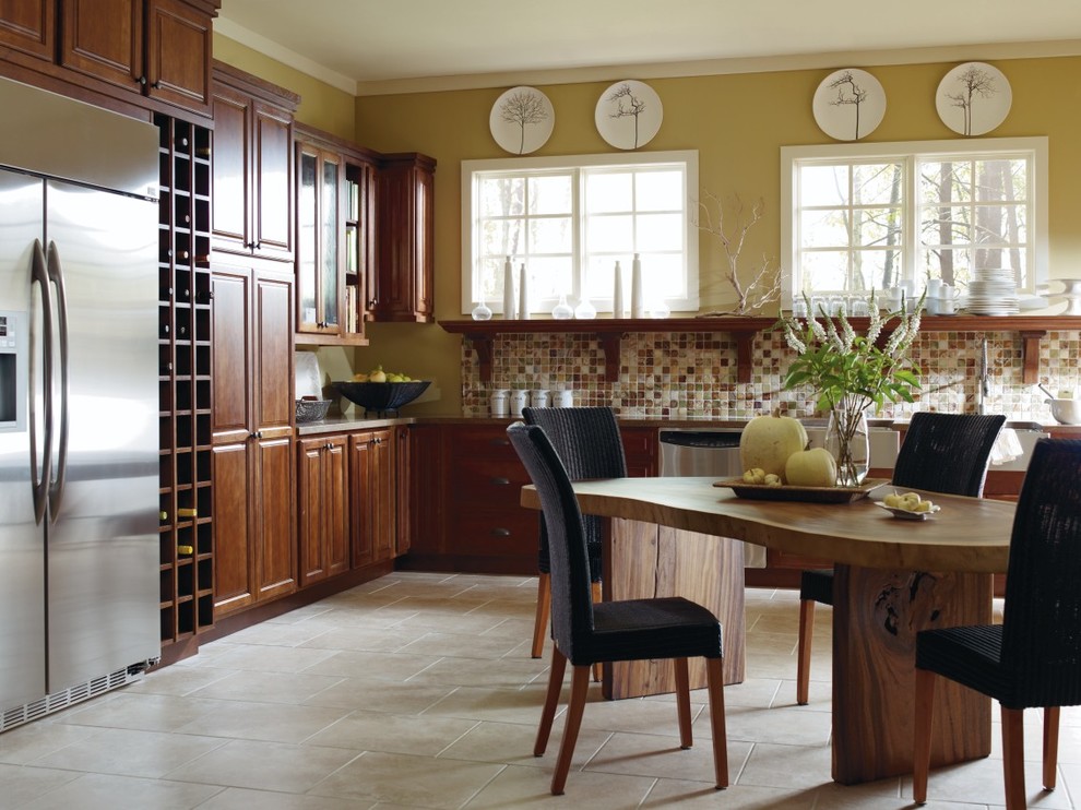 Eat-in kitchen - rustic l-shaped eat-in kitchen idea with an integrated sink, medium tone wood cabinets, beige backsplash and stainless steel appliances