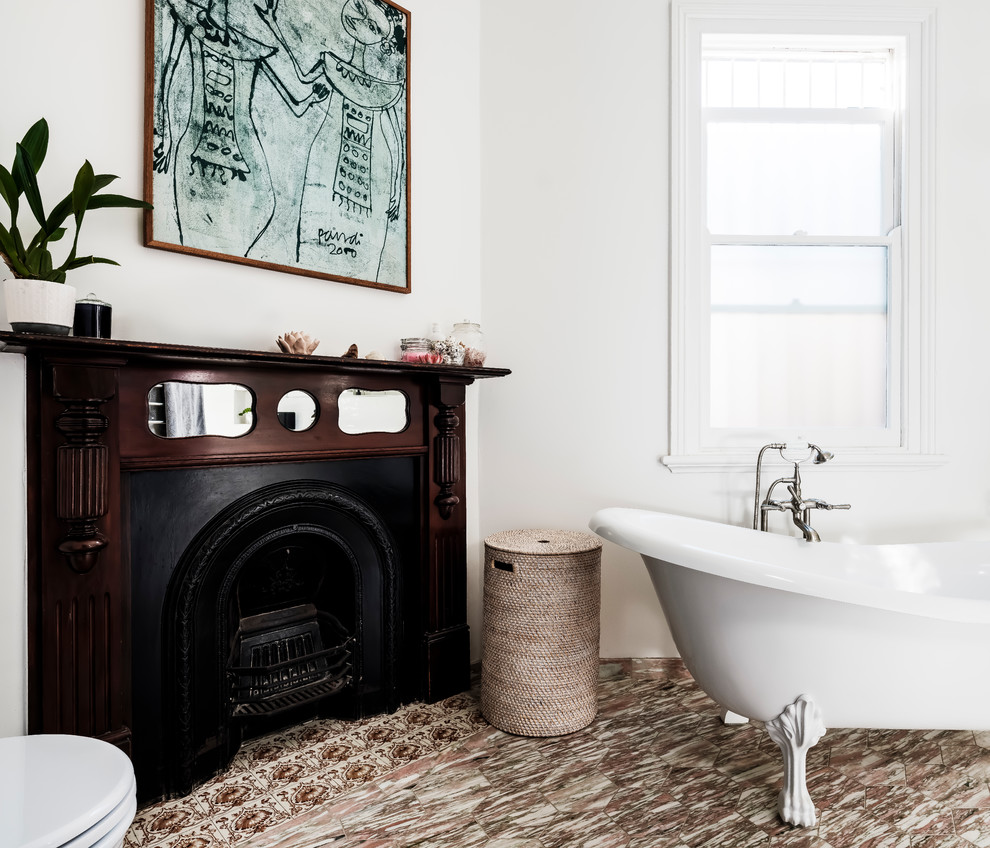 Mid-sized eclectic master bathroom in Sydney with open cabinets, white cabinets, a claw-foot tub, an alcove shower, a one-piece toilet, white tile, ceramic tile, white walls, marble floors, a console sink, engineered quartz benchtops, multi-coloured floor, a hinged shower door and green benchtops.