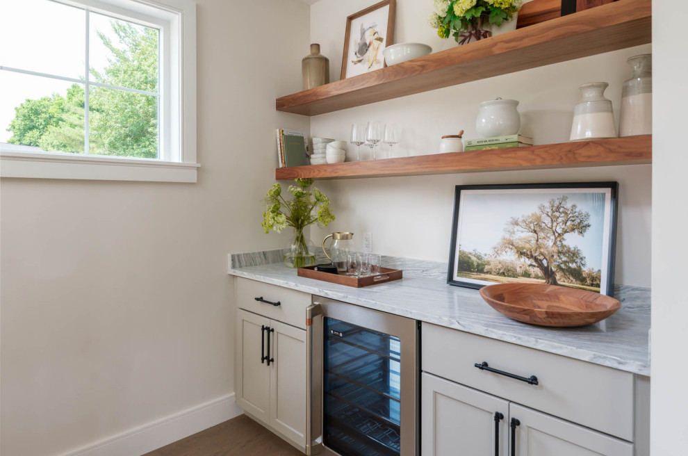 Inspiration for a transitional home bar remodel in Boston