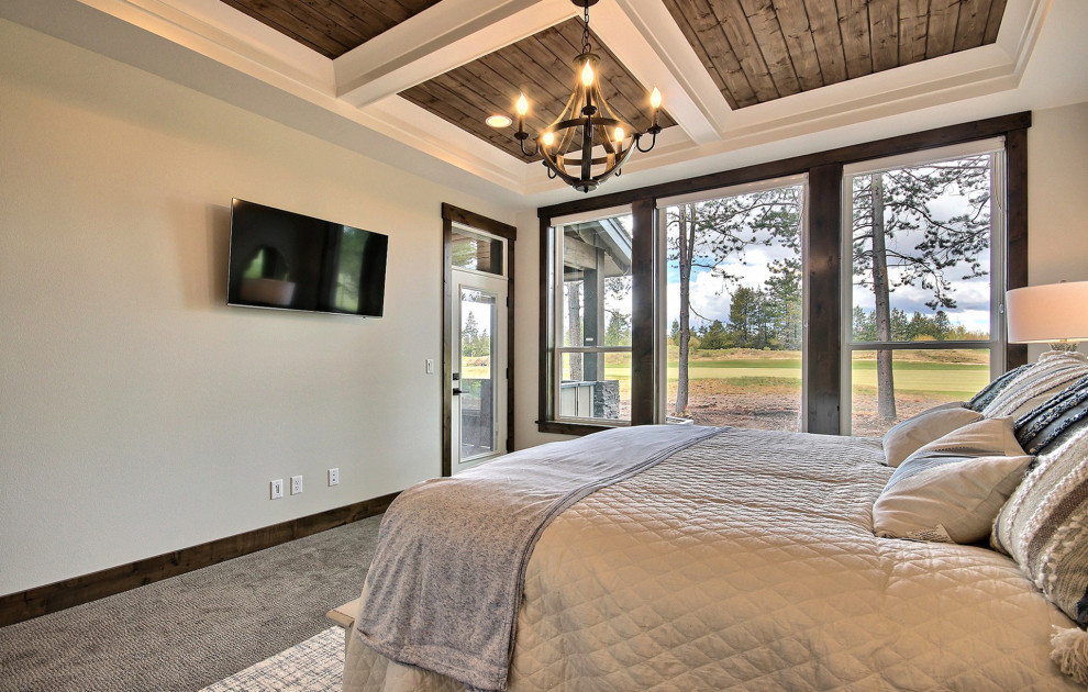 Design ideas for a large classic master bedroom in Portland with beige walls, carpet, no fireplace, brown floors and a coffered ceiling.
