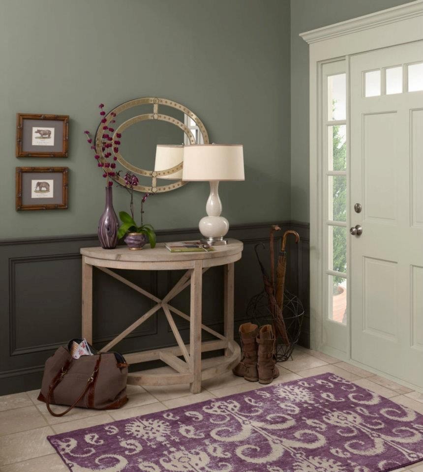 Example of a mid-sized transitional ceramic tile foyer design with blue walls and a white front door