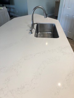 Inspiration for a mid-sized transitional u-shaped porcelain tile and gray floor open concept kitchen remodel in Phoenix with a drop-in sink, shaker cabinets, gray cabinets, quartz countertops, green backsplash, glass tile backsplash, stainless steel appliances and an island