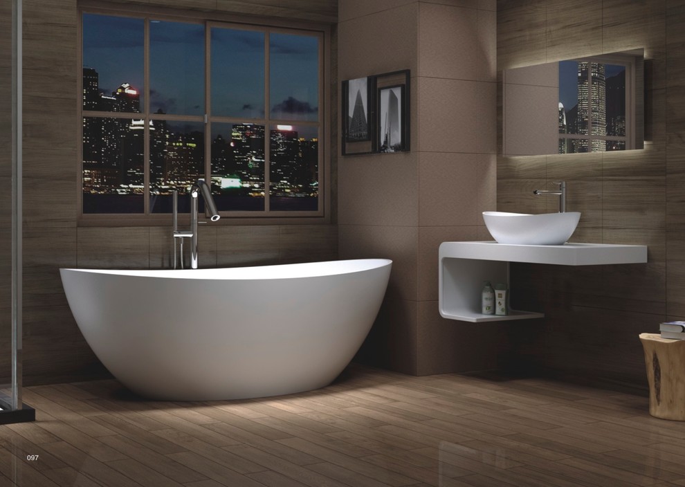 Photo of a contemporary bathroom in Sydney with a vessel sink and a freestanding tub.