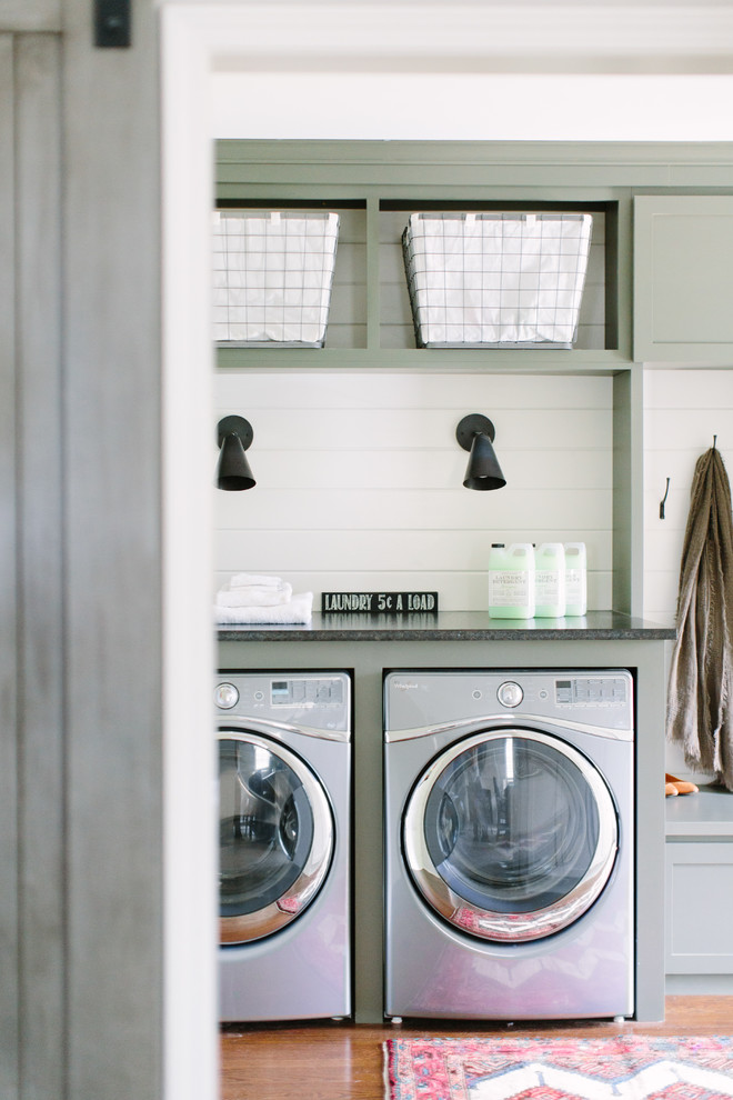 This is an example of a beach style laundry room in Chicago.