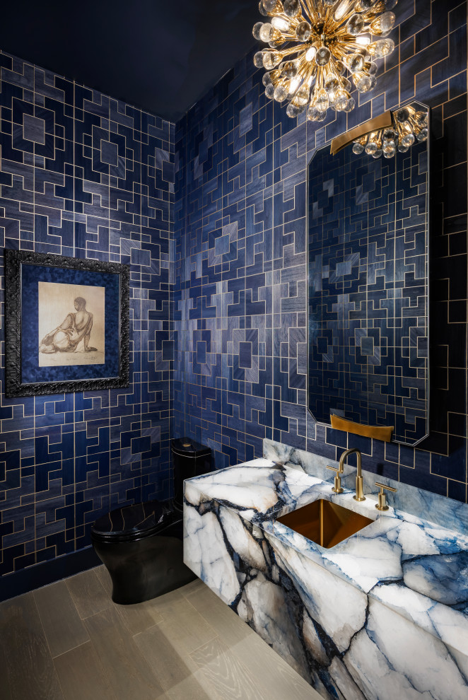Inspiration for an eclectic wallpaper and beige floor powder room remodel in Orlando with blue cabinets, blue walls, an undermount sink, multicolored countertops and a floating vanity