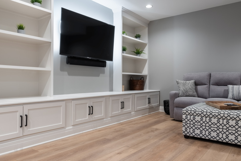 Design ideas for a medium sized modern fully buried basement in San Diego with a home cinema, grey walls, vinyl flooring, beige floors and all types of ceiling.