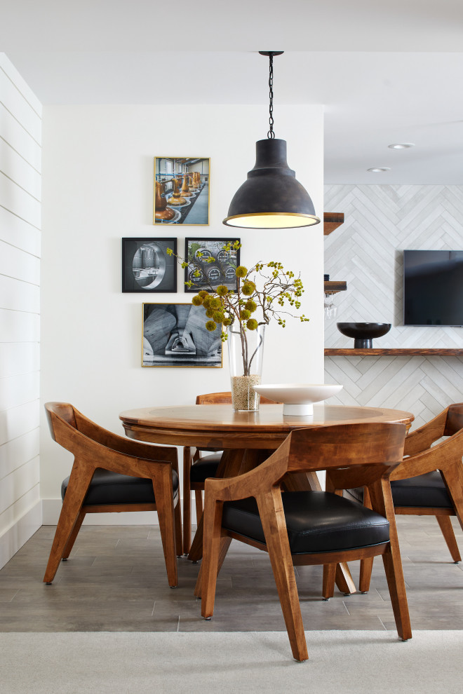 Example of a trendy dining room design in New York