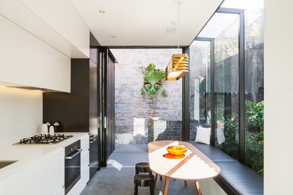 Design ideas for a contemporary eat-in kitchen in Sydney.