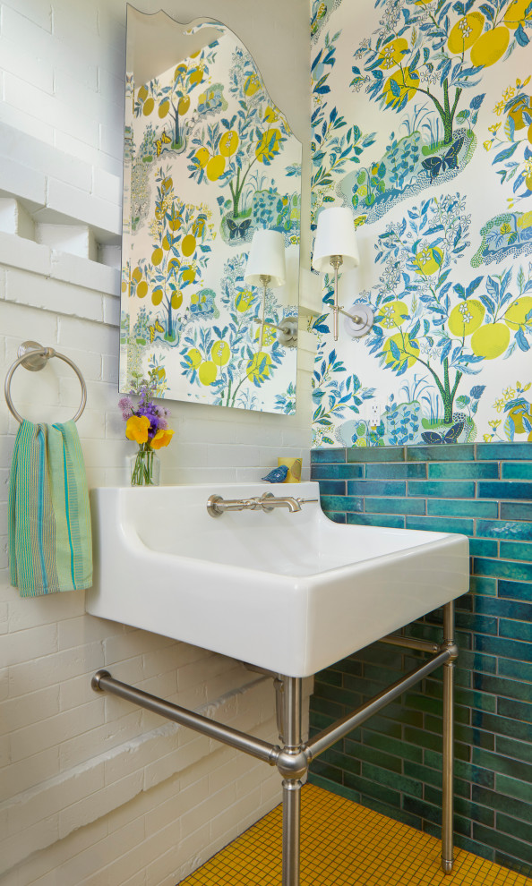 Design ideas for a transitional powder room in Denver with blue tile, multi-coloured walls, mosaic tile floors, a console sink, yellow floor and wallpaper.