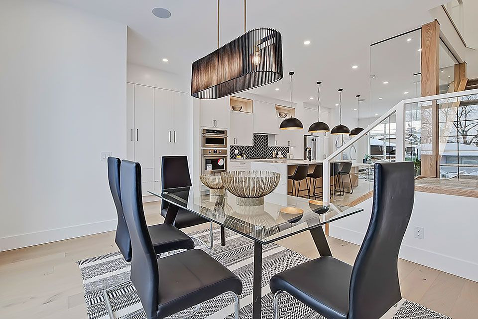 Transitional home design photo in Calgary