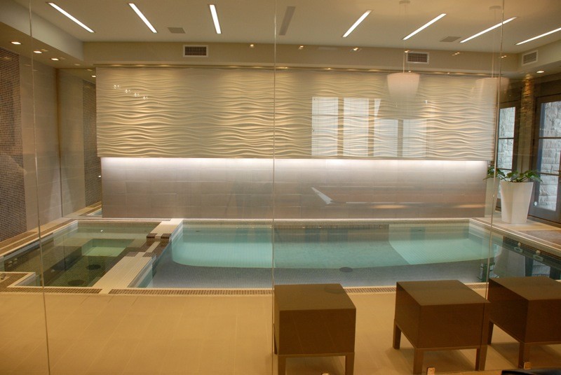 Pool - mid-sized rustic tile and rectangular indoor pool idea