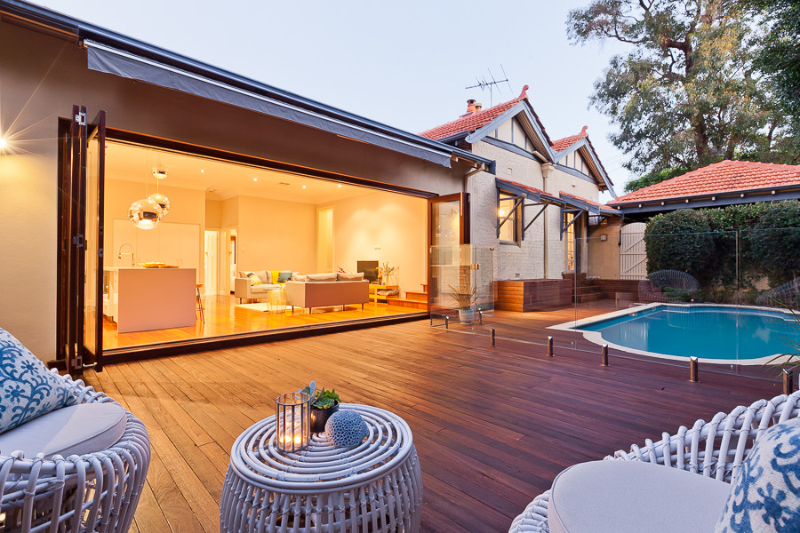 Design ideas for a mid-sized contemporary backyard patio in Perth with decking and no cover.